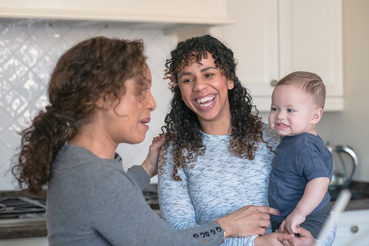 Mother and baby in kitchen